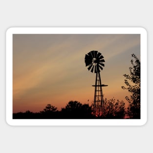 Windmill silhouette with a colorful Sunset Smokey sky Sticker